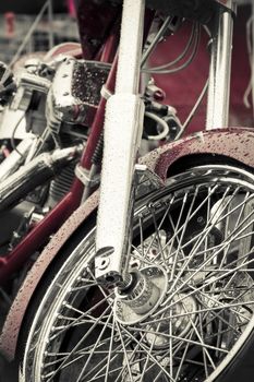 rain soaked red and chrome motorcycle abstract