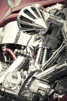 rain soaked red and chrome motorcycle abstract