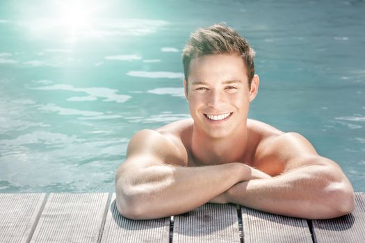 An image of a handsome young man at the pool
