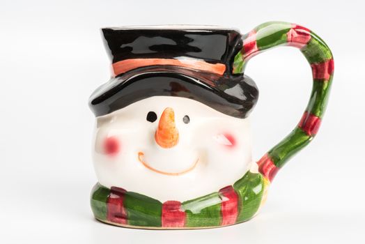 Christmas tea mug with snowman on white background