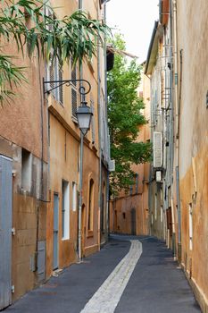 Street and ancient buildings in the old hystorical part of Aix en Provence town, South France