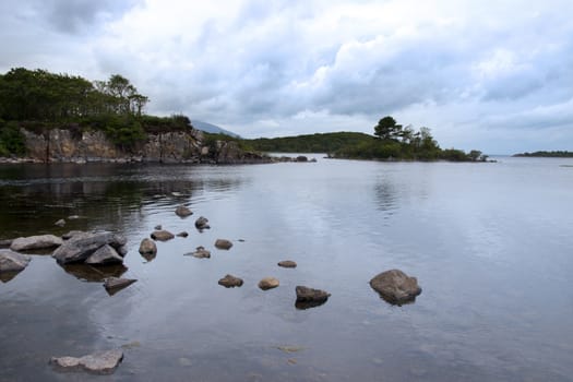 rocks on a beautiful clean and clear lake in county Donegal Ireland