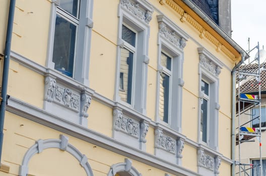 View of a freshly renovated and painted house facade.