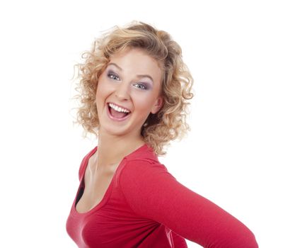 young blond woman in red top laughing - isolated on white