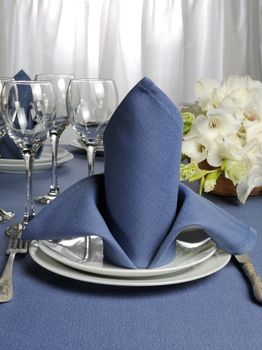 Fragment table setting decorated with flower napkin