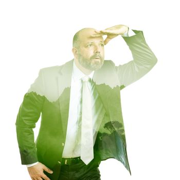 An image of a business man double exposure green tree