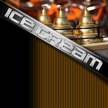 Black, orange and metal background with detail of an ice cream cart. Template for a ice cream menu
