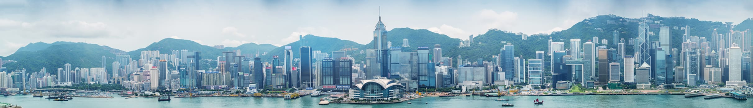 HONG KONG - MAY 12, 2014: Stunning panoramic view of Hong Kong Island skyline on a cloudy day. Last year HK hosted more than 54 million visitors, most of them from the mainland.