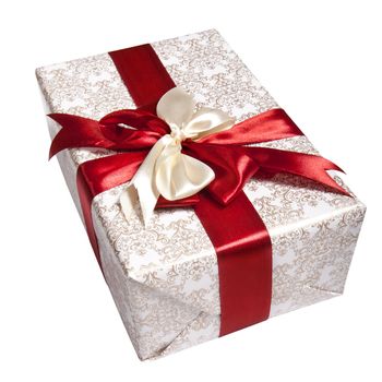gift packing tied by red ribbon, isolated on white with path