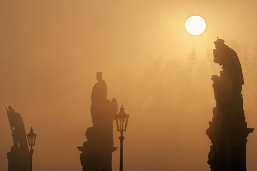 czech republic prague - charles bridge on foogy morning