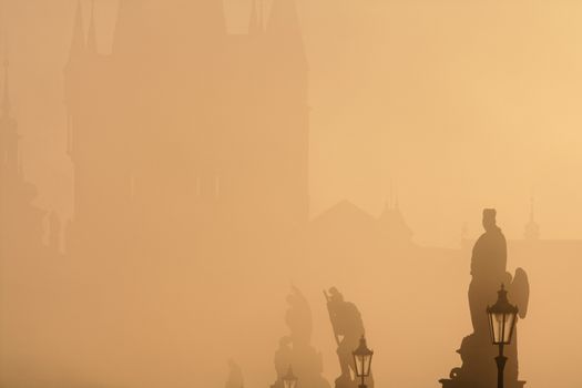 czech republic prague - charles bridge on foogy morning