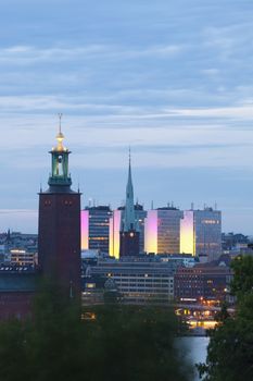 sweden stockholm - town hall and city highrises during long summer night