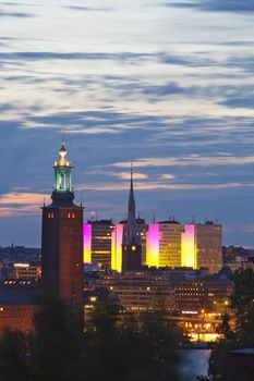 sweden stockholm - town hall and city highrises during long summer night