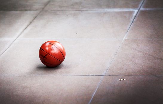 focus dirty basket ball on the cement floor