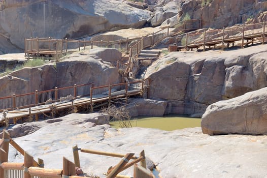 Huge whirlpool filled with water at the Augrabies Falls in the Orange River
