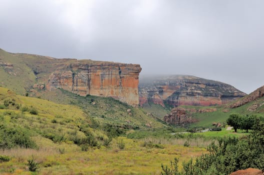 Red, orange and yellow sandstone cliffs in the Golden Gate Highlands National Park, South Africa
