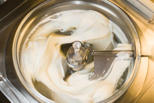 Ice cream preparation with different tools, ingredients, and machines