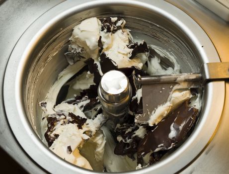 Ice cream preparation with different tools, ingredients, and machines