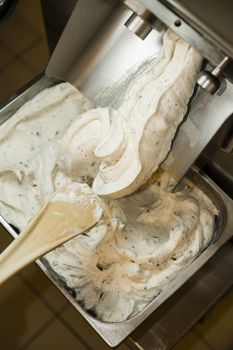 Ice cream preparation with different tools, ingredients, and machines
