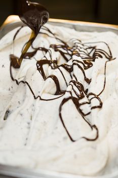 Ice cream preparation with different tools, ingredients, and machines