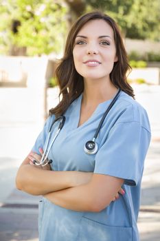 Proud Attractive Young Adult Woman Doctor or Nurse Portrait Outside.