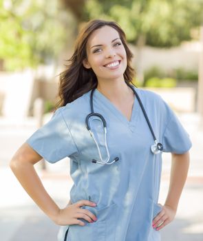 Proud Attractive Young Adult Woman Doctor or Nurse Portrait Outside.