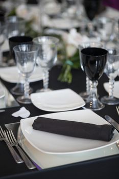 Ceremony silverware and decoration on elegant table