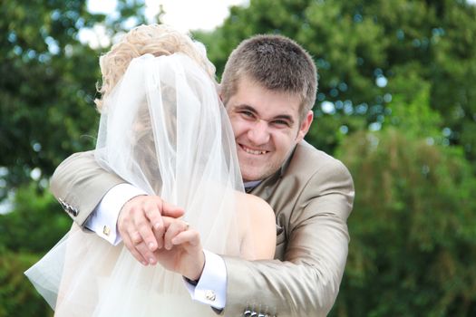 Young married couple in the wedding day