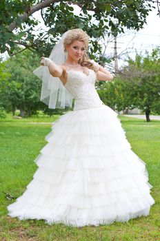 The young beautiful wife in the wedding day