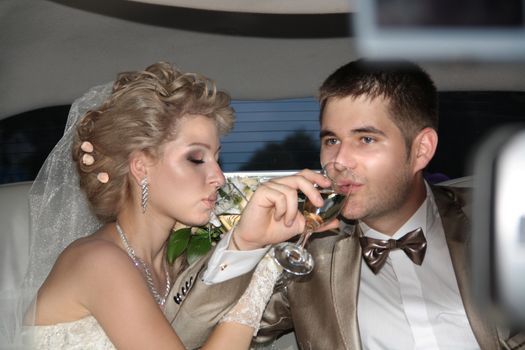 Young married couple in the wedding day