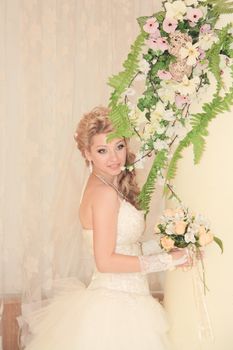 The young beautiful wife in the wedding day