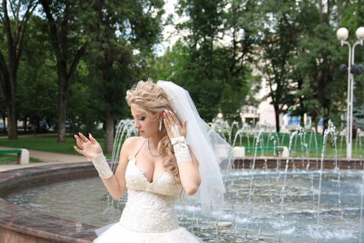 The young beautiful wife in the wedding day