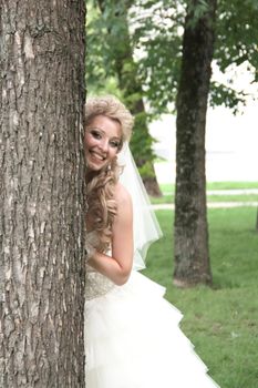 The young beautiful wife in the wedding day