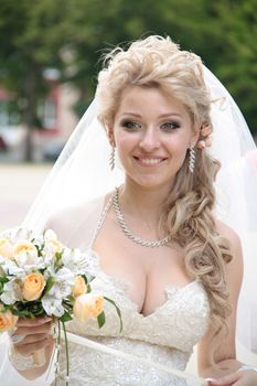 The young beautiful wife in the wedding day