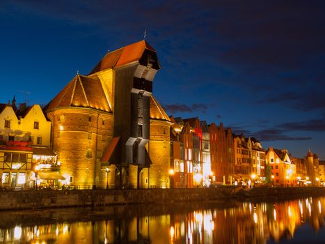 Crane at Motlawa river by night, Gdansk, Poland