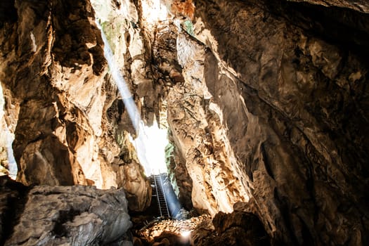 fantastic light in entrance of cave Koa-yoy at Thailand