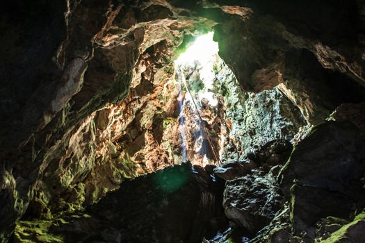 fantastic light in entrance of cave Koa-yoy at Thailand