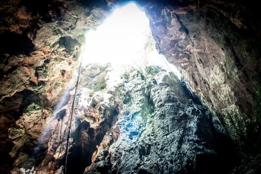 fantastic light in entrance of cave Koa-yoy at Thailand