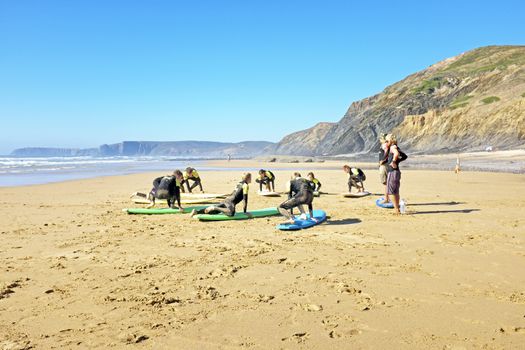 VALE FIGUEIRAS, PORTUGAL - August 9 2014:  Surfers getting lessons