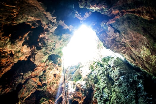 fantastic light in entrance of cave Koa-yoy at Thailand