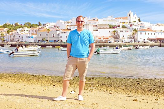 Tourist at the beach near Ferragudo Portugal