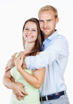 Portrait of a Happy Young Couple Smiling Looking - Isolated on White