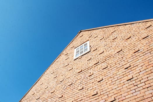 brick barn and sky