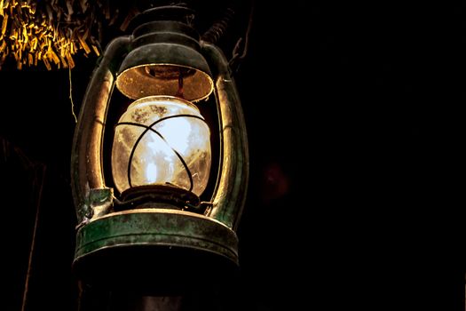 light from vintage lamp on dark