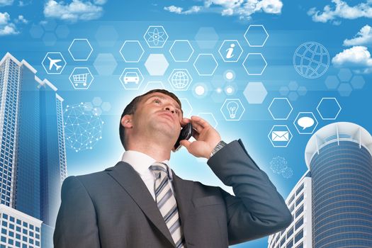 Businessman talking on the phone. Skyscrapers, sky and hexagons with icons in background