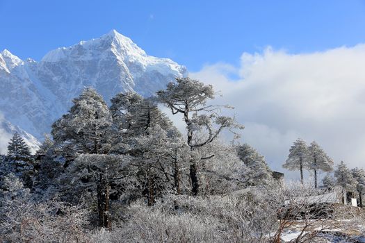 Movement of the clouds on the mountains Kongde Ri, Himalayas, Nepal