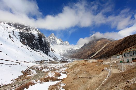 Movement of the clouds on the mountains Cho Oyu, Himalayas, Nepal