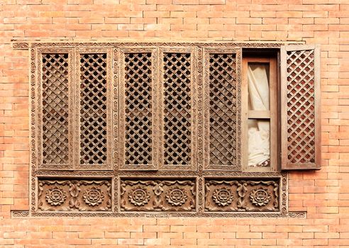 Old wooden traditional Nepalese window detail. Nepal