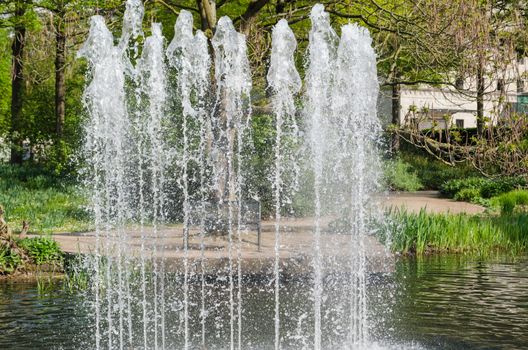 Water feature, fountain fountain in a public park.
