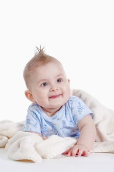 portrait of sweet little baby girl with a blanket - isolated on white